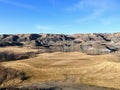 Beautiful vistas of a golf course in the badlands surrounded by canyons, hoodoos, coulees and mountains outside of Drumheller