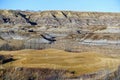 Beautiful vistas of a golf course in the badlands surrounded by canyons, hoodoos, coulees and mountains outside of Drumheller