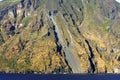 Beautiful volcanic island with green vegetation in the Mediterranean Sea on a clear sunny day Royalty Free Stock Photo