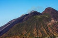 Beautiful volcanic island with green vegetation in the Mediterranean Sea on a clear sunny day Royalty Free Stock Photo