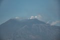 Beautiful volcanic Mount Etna with blue sky in background during summer Royalty Free Stock Photo