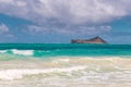 Beautiful Waimanalo beach with turquoise water and cloudy sky, Oahu coastline Royalty Free Stock Photo