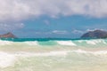 Beautiful Waimanalo beach with turquoise water and cloudy sky, Oahu coastline Royalty Free Stock Photo