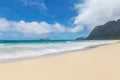 Beautiful Waimanalo beach with turquoise water and cloudy sky, Oahu coastline Royalty Free Stock Photo