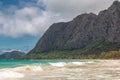 Beautiful Waimanalo beach with turquoise water and cloudy sky, Oahu coastline Royalty Free Stock Photo