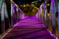 Beautiful walking bridge with purple lights urban cityscape in scheveningen the netherlands Royalty Free Stock Photo
