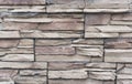 Beautiful wall made of tiles imitating natural stone. Finishing material - tile Royalty Free Stock Photo