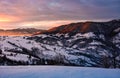 Winter sunrise in mountainous rural area Royalty Free Stock Photo