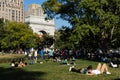 Beautiful Washington Square Park Scene with a Couple Kissing on the Grass in New York City