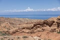The beautiful wasteland of Skazka Canyon with Lake Issyk-Kul in the background in Kyrgyzstan