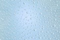 Beautiful water droplets of regular shape on frosted glass Royalty Free Stock Photo