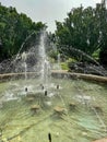 Beautiful water fountain in garden setting Royalty Free Stock Photo