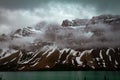 Beautiful water and snow covered mountains in the early morning, Waterfowl Lake Alberta