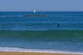 Beautiful watercolor closeup of blue beach stone ocean biarritz. Summer background. Outdoor landscape. Sea sand sun.