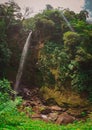 Beautiful waterfall in Boquete part of Panama called the hidden waterfalls. Beautiful jungle setting with lush greens and big moss