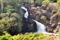 Beautiful Waterfall Cascading Down in a Tropical Surrounding