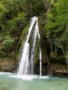 Beautiful waterfall, coming on green moss. It is located in Georgia and is called Kaghu Waterfall