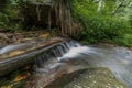 Beautiful Waterfall in deep forest at Waterfall in Himalayas, Sainj Valley, Himachal Pradesh, India Royalty Free Stock Photo