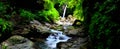 The beautiful waterfall flow from the end of peaceful forest Royalty Free Stock Photo