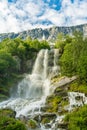 Beautiful waterfall flowing down a mountainside in Norway