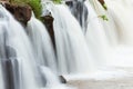 Beautiful waterfall. Gently waters falling off the cliff. Tad Pha Suam is not a huge waterfall, but the shape is rather unique. Royalty Free Stock Photo