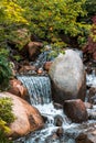 Beautiful waterfall hidden in the japanese garden during the summer Royalty Free Stock Photo