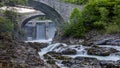 Beautiful Waterfall hiding under Bridges Royalty Free Stock Photo