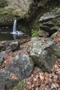 Beautiful waterfall landscape image in forest during Autumn Fall Royalty Free Stock Photo