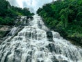 Beautiful waterfall in lush tropical green forest. Nature landscape. Mae Ya Waterfall is situated in Doi Inthanon National Park, Royalty Free Stock Photo