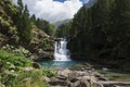 Waterfall in the forest of `Cola de Caballo` in Aragon, Spain