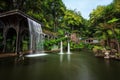 Beautiful waterfall at Monte Palace Tropical Garden in Funchal, Madeira Royalty Free Stock Photo