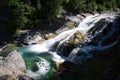 Beautiful waterfall at the mountain. Waterfall in tropical green tree forest. Waterfall is flowing in jungle. Nature abstract Royalty Free Stock Photo