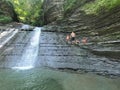 Climbing up a waterfall in Hector National Forest