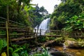 beautiful waterfall in northern Thailand, name Pha dok siew waterfall in Doi intanon national park with bamboo bridge Royalty Free Stock Photo