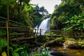 beautiful waterfall in northern Thailand, name Pha dok siew waterfall in Doi intanon national park with bamboo bridge Royalty Free Stock Photo