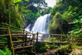 beautiful waterfall in northern Thailand, name Pha dok siew waterfall in Doi intanon national park with bamboo bridge Royalty Free Stock Photo