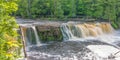 Beautiful waterfall at Porcupine Mountains Wilderness State Park in the Upper Peninsula of Michigan - smooth tranquil flowing wate Royalty Free Stock Photo