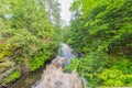 Beautiful waterfall at Porcupine Mountains Wilderness State Park in the Upper Peninsula of Michigan - smooth tranquil flowing wate Royalty Free Stock Photo