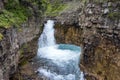 Beautiful waterfall among rocks in form of cup. Tekes waterfall in Kazakhstan. Kazakhstan nature. Royalty Free Stock Photo