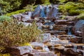 Beautiful waterfall in the statue gardens at the Frederik Meijer Gardens