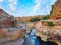 A beautiful waterfall surrounded by rocky mountain at Chidiya Bhadak, Indore, Madhya Pradesh, India