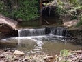 Beautiful waterfall under a bridge in Charlottesville Virginia Royalty Free Stock Photo