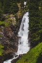 Beautiful waterfall in a wood on the Italian Dolomites Royalty Free Stock Photo