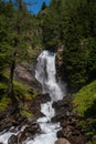 Beautiful waterfall in a wood on the Italian Dolomites Royalty Free Stock Photo