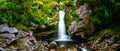 Beautiful waterfalls in the green nature, Wainui Falls, Abel Tasman, New Zealand Royalty Free Stock Photo