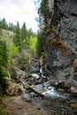 Beautiful waterfalls through huge rocks and forests in Banff Canada Royalty Free Stock Photo