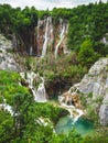 Beautiful waterfalls surrounded by lush greenery in Plitvice Lakes National Park. Croatia Royalty Free Stock Photo