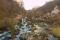 Beautiful Waterfalls in the Village near Forest at Sunset