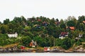 Beautiful waterfront houses Inner Oslofjiord coast Norway Royalty Free Stock Photo