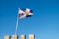 Beautiful waving Lisbon flag over the tower of Saint Jorge Castle. Lisbon Royalty Free Stock Photo